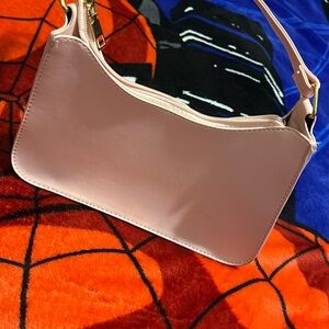 Selling my pink purse I don’t want it no more only used it like three times